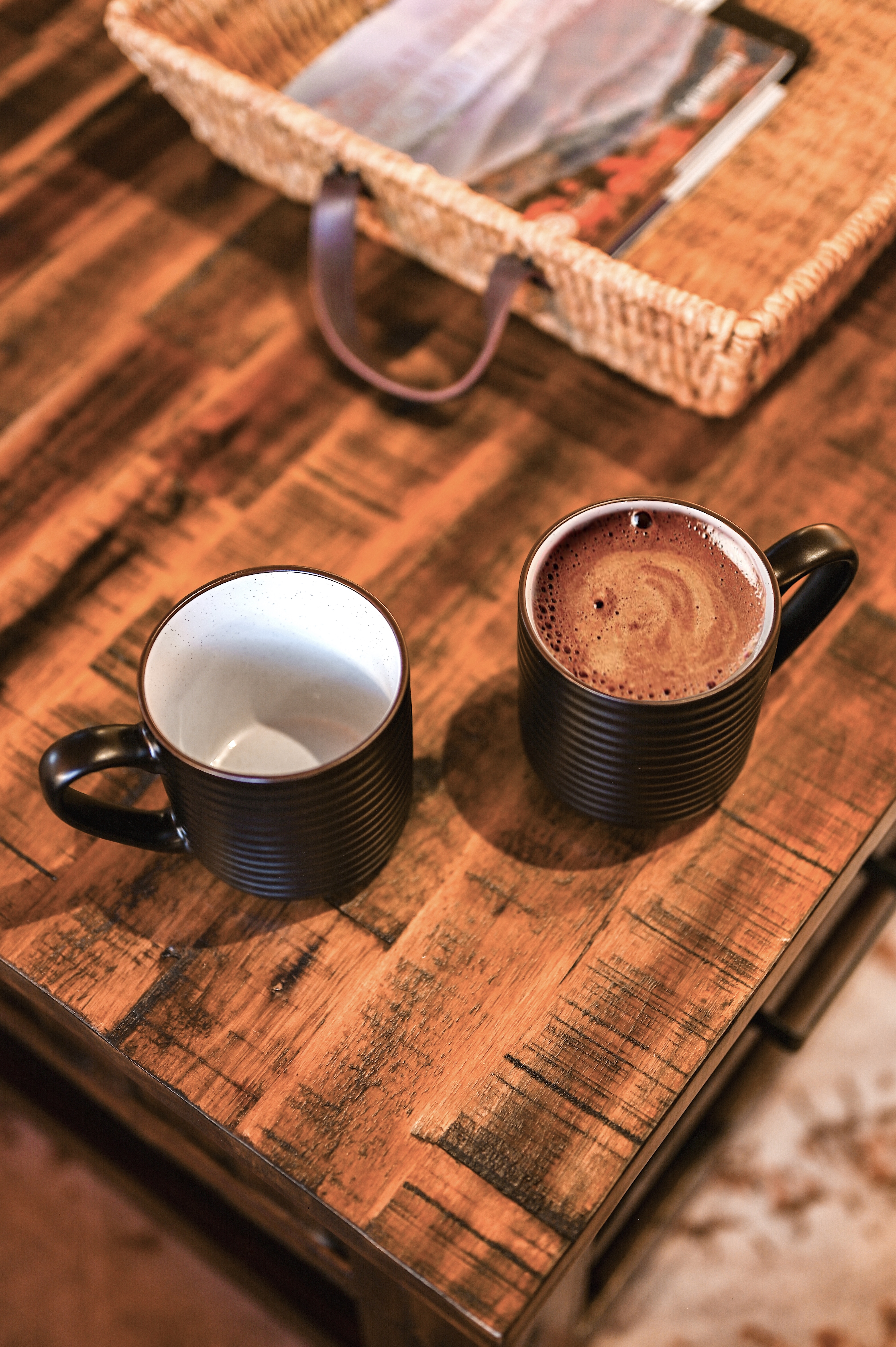 Hot coffee and cocoa on rustic wood table