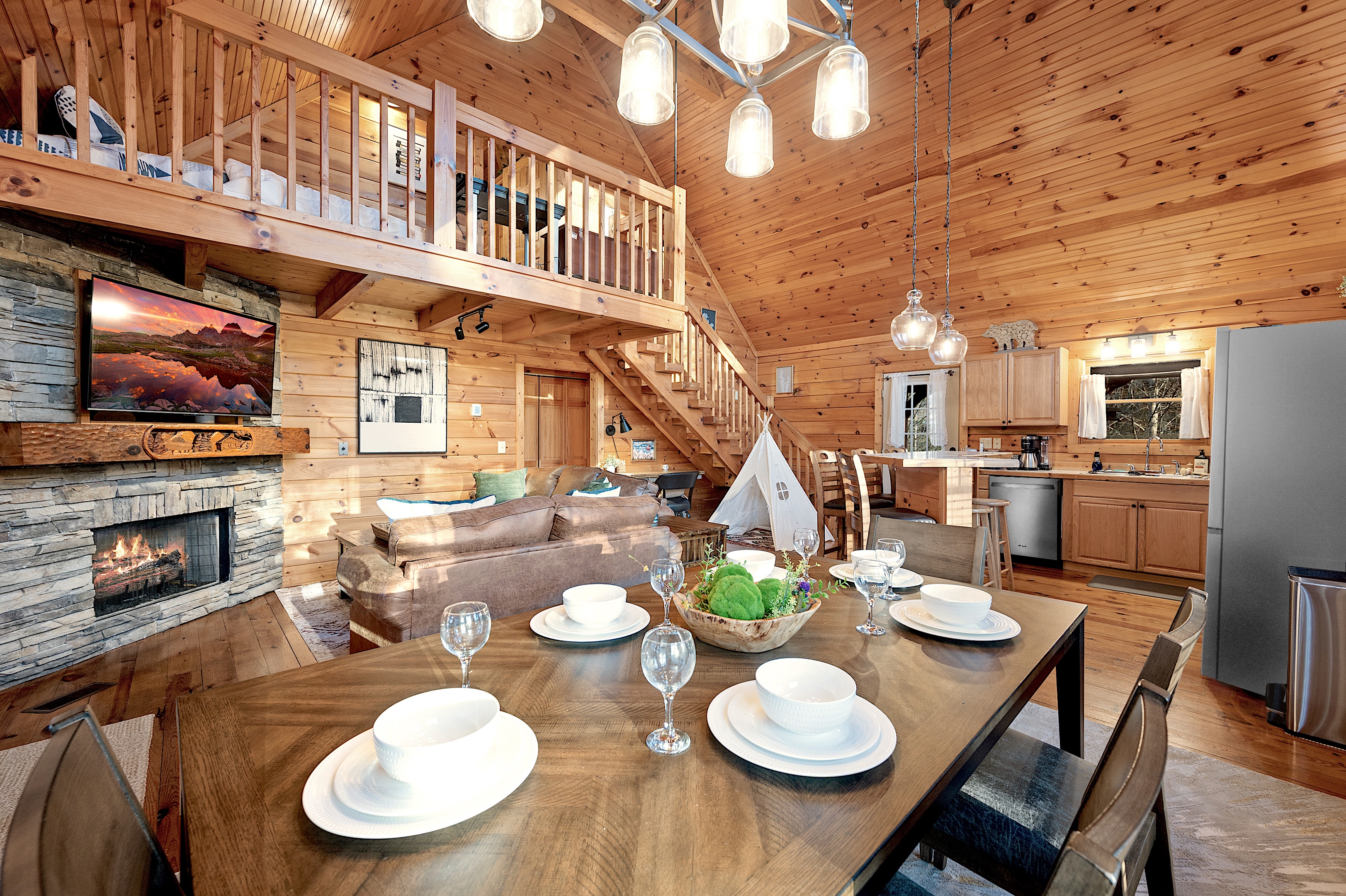 Elegant dining table set for dinner with open floor plan view