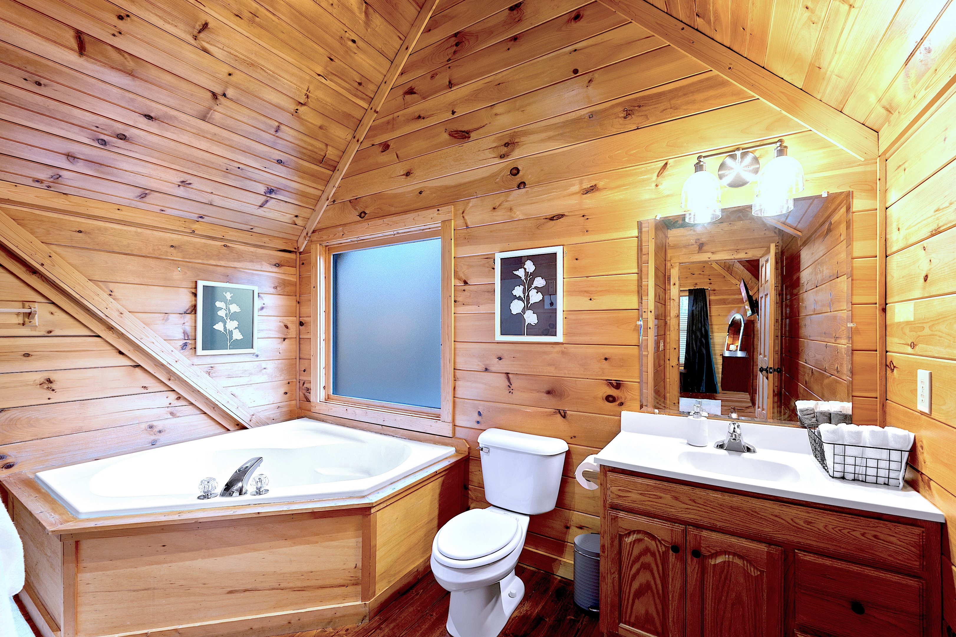 Spa-like bathroom with corner jacuzzi tub