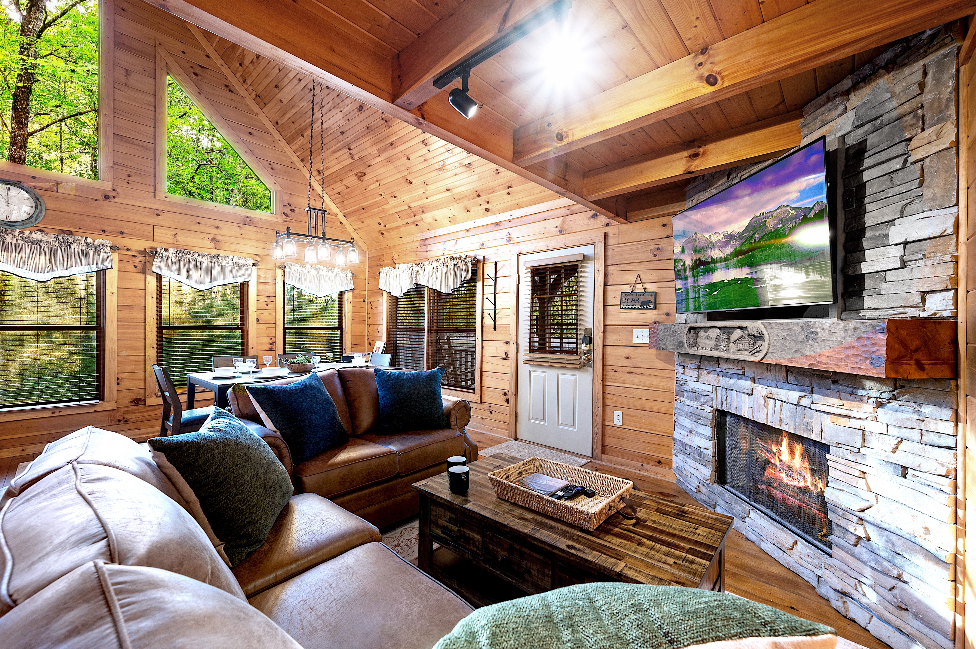 Living area with summer forest views