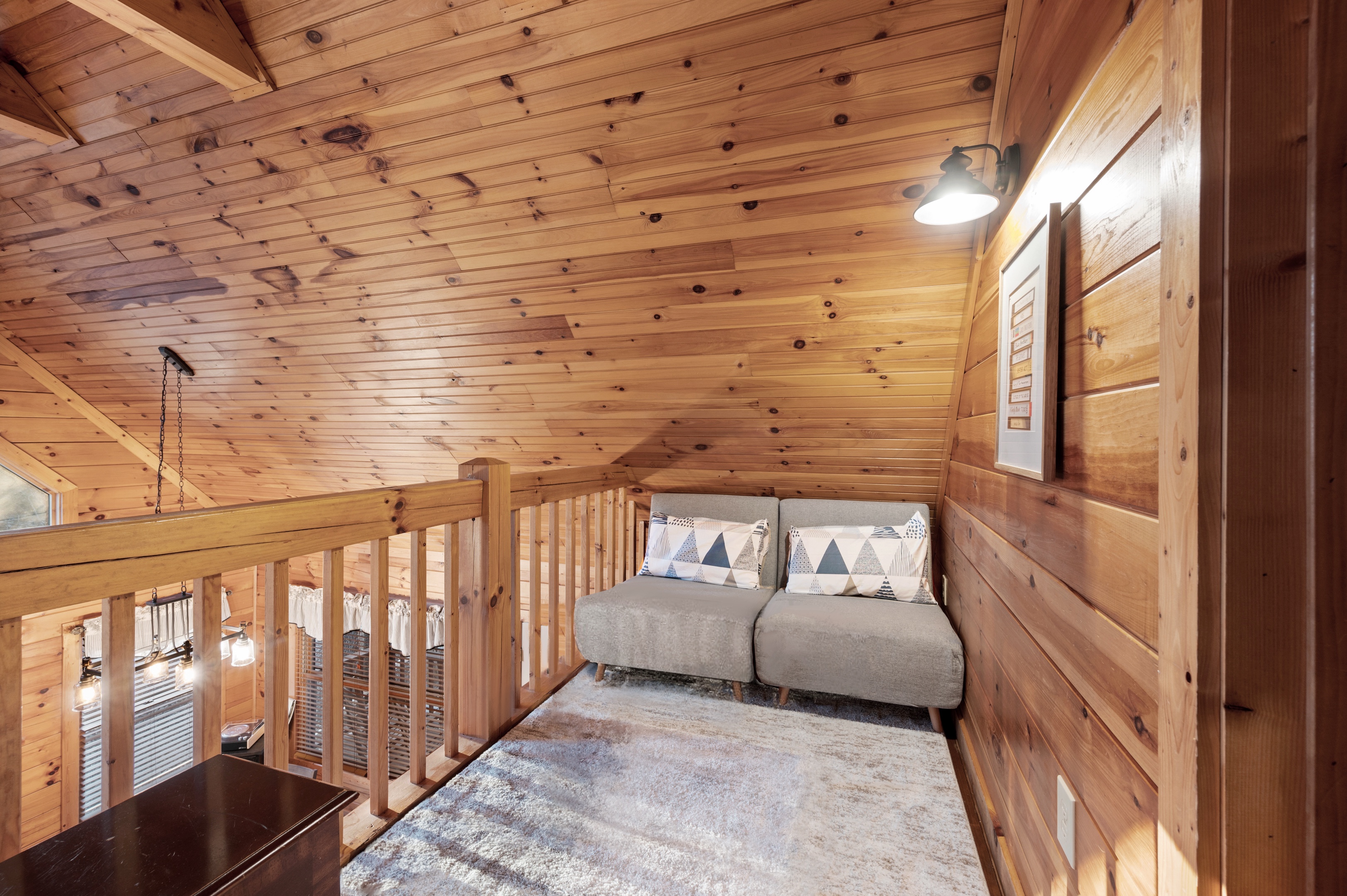 Cozy loft seating area with geometric pillows